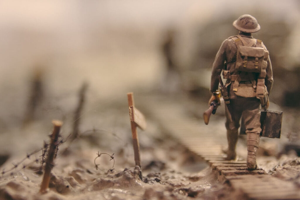 soldier walks through war torn wasteland