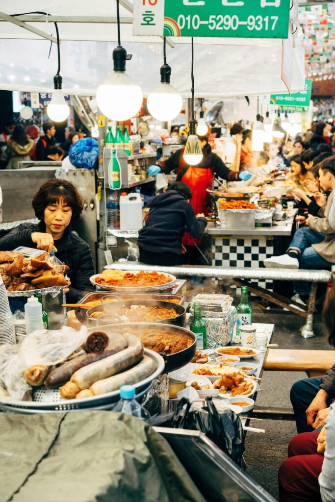 people in a traditional market in Seoul, South Korea