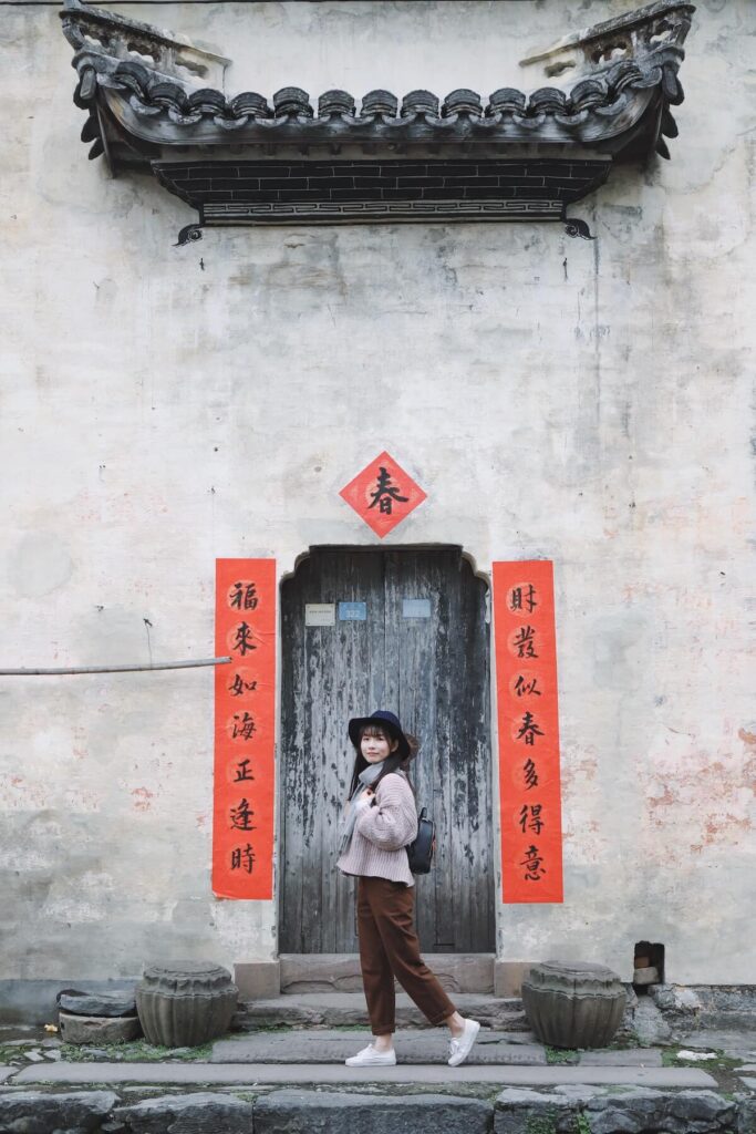 chinese girl outside house