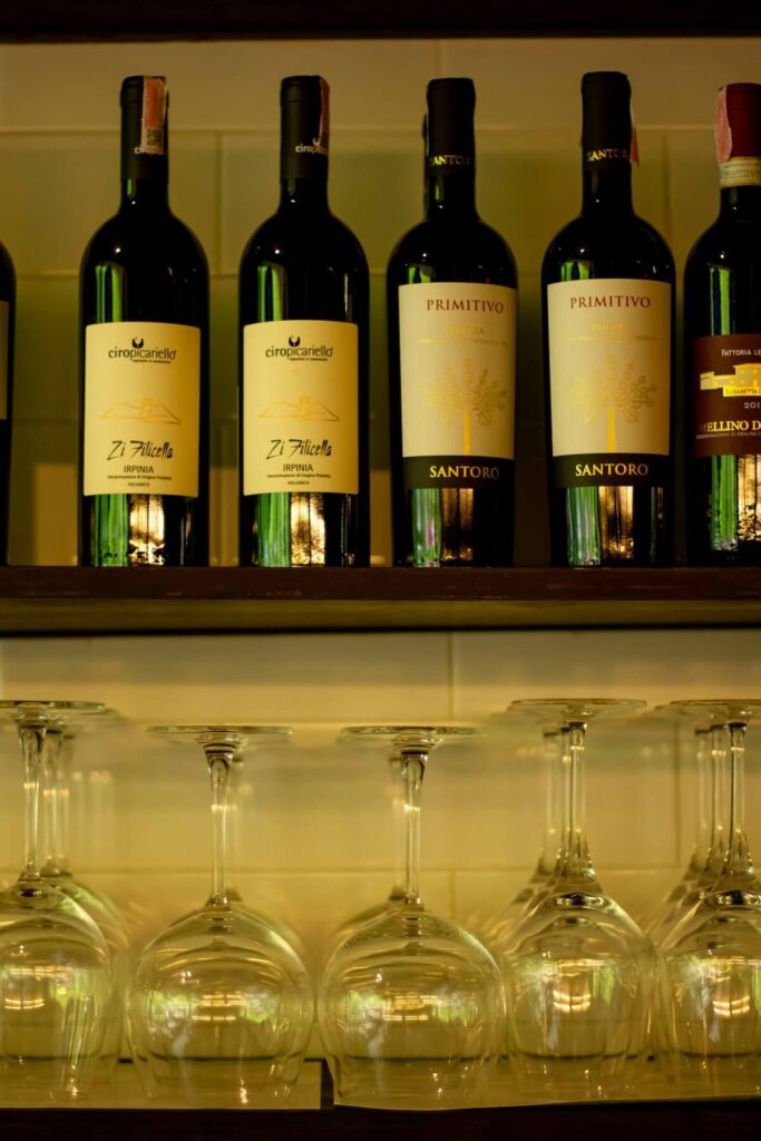 bottles of italian wine on shelf
