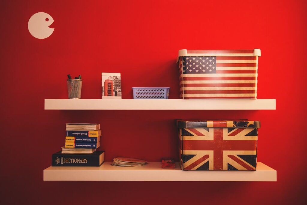 boxes designed with UK and USA flags and other items in shelves