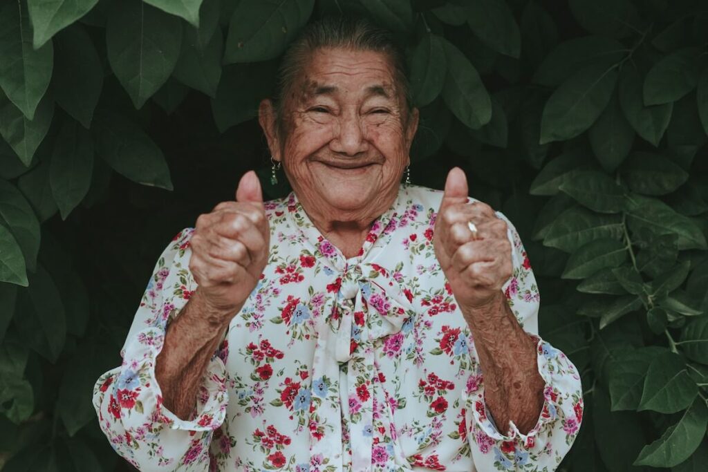 old woman thumbs up