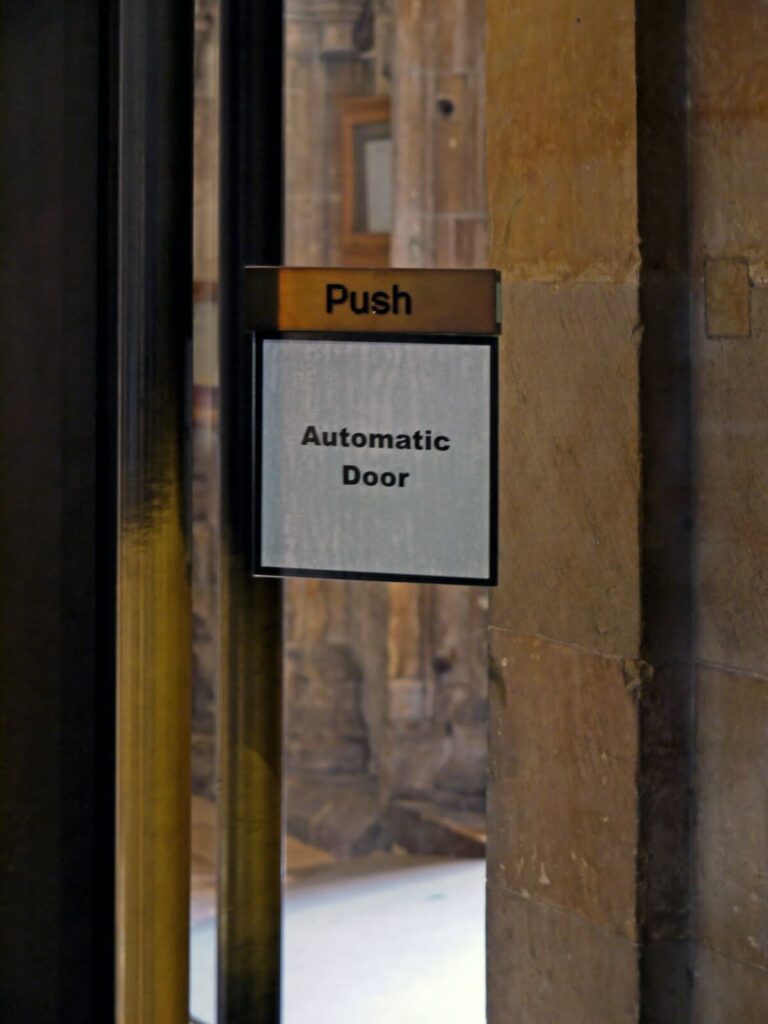 conflicting signs on door