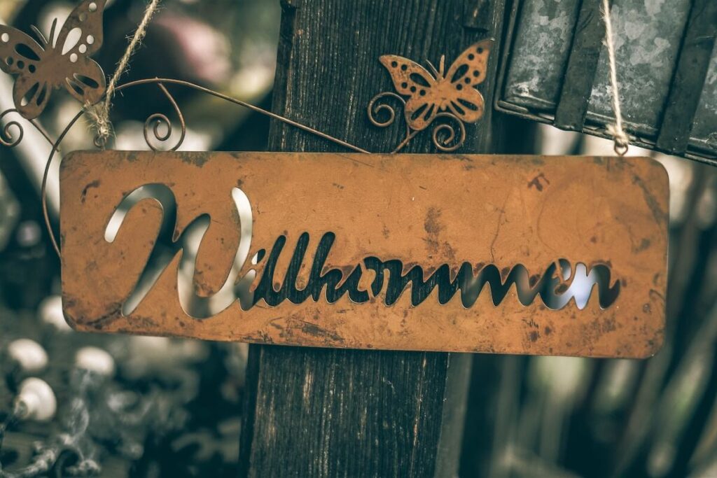 willkommen wooden sign