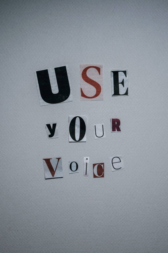 Cut out letters spelling use your voice