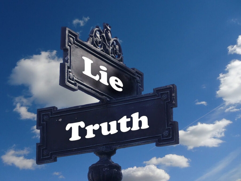 Black lie and truth signs