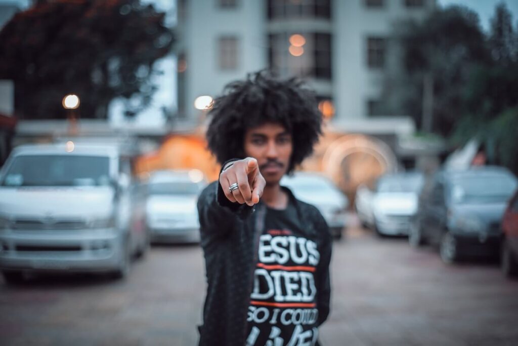 man pointing at viewer