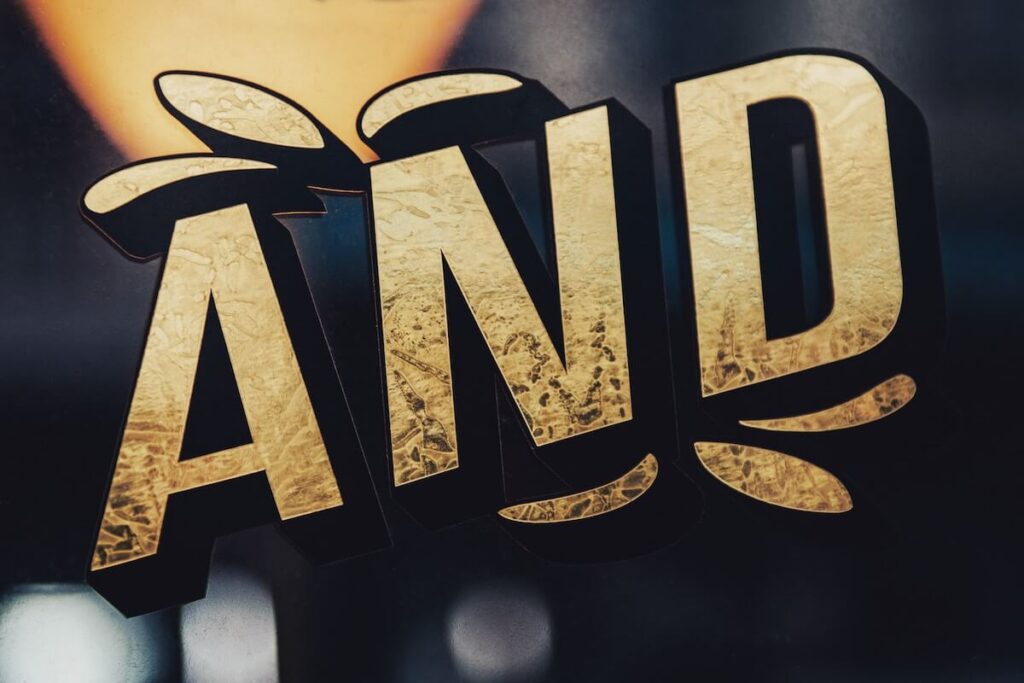 Gold letters spelling and