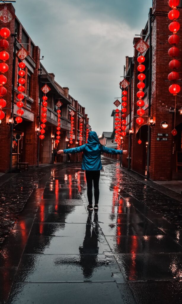 woman standing in Chinese street