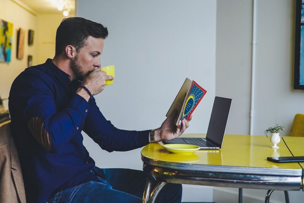 Reading book over coffee