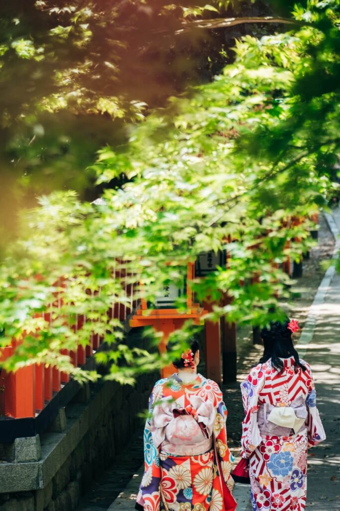 two women wearing kimono near Yasaka Shrine in Kyoto