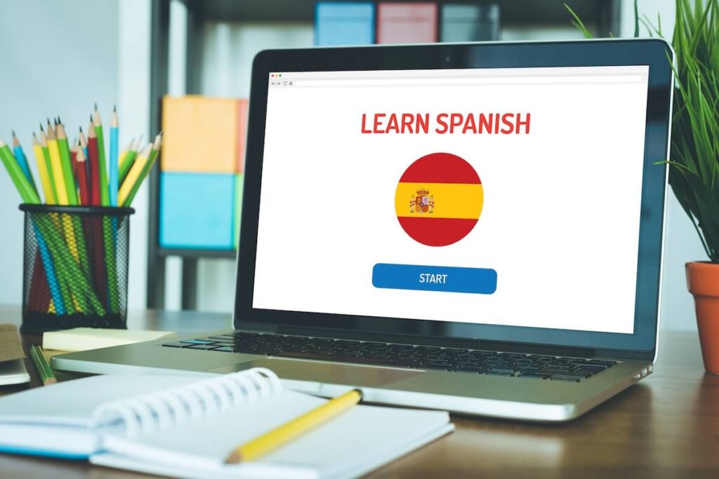 laptop showing Spanish online course