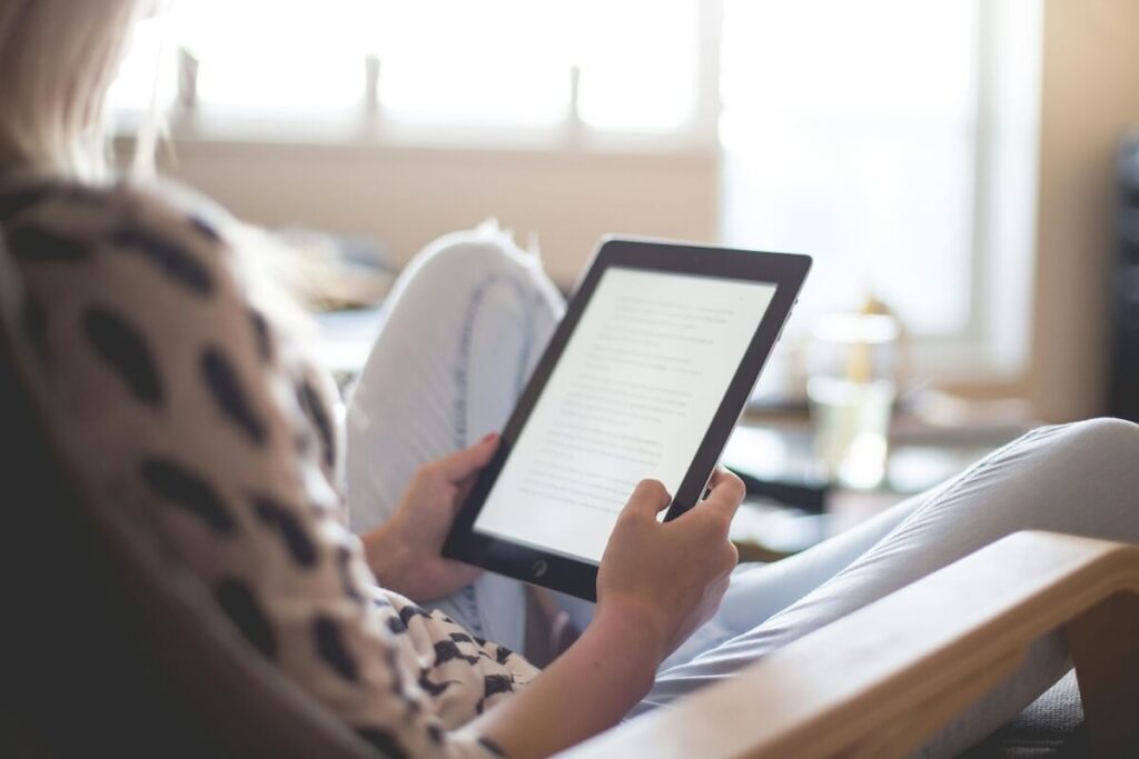 woman reading something on iPad