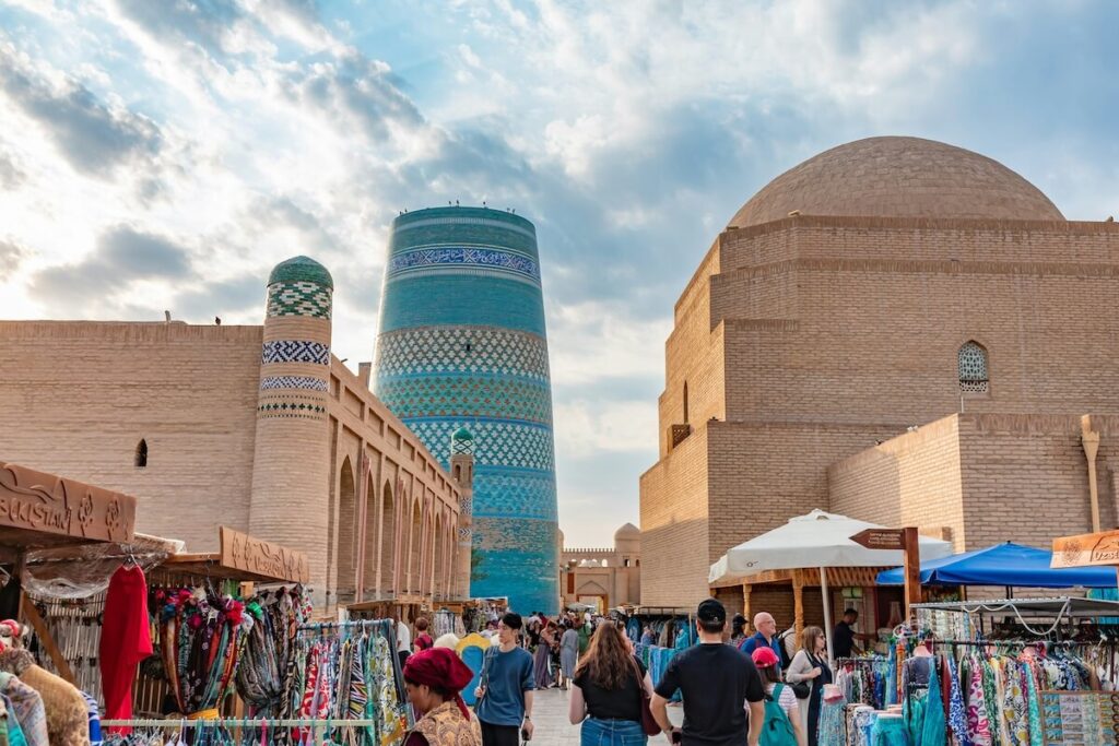 tourists walking through market in Khiva, Uzbekistan