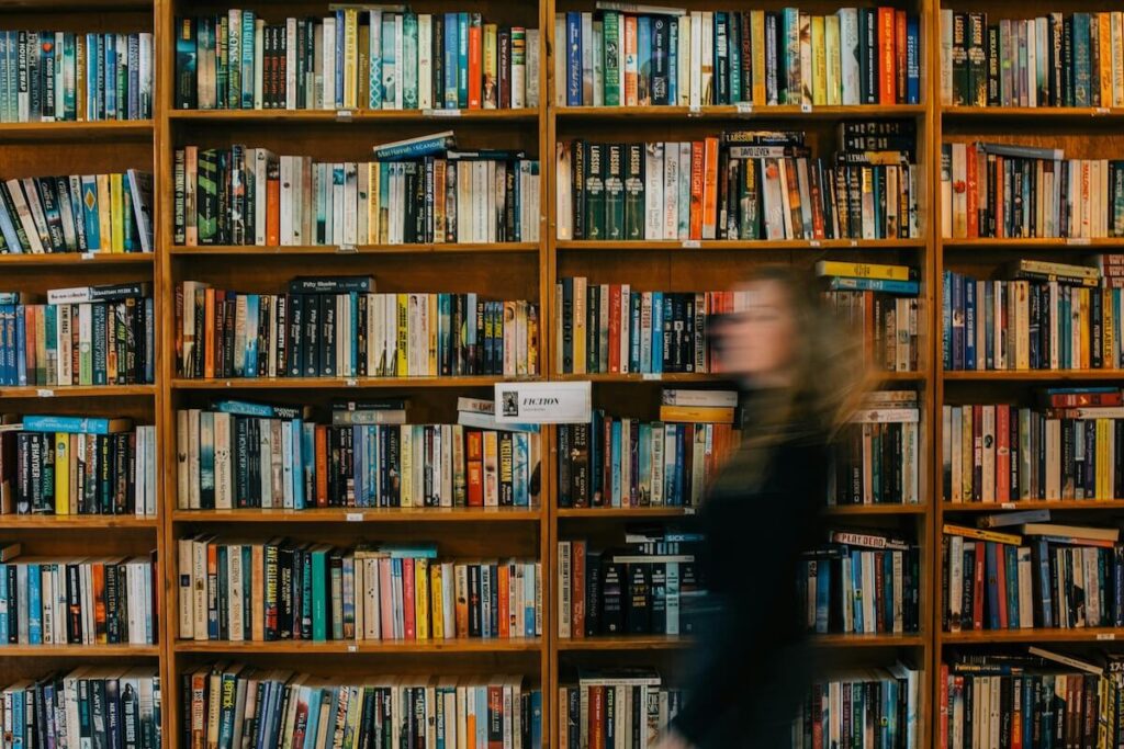 time-lapse of woman passing by row of books in a book shop in Galway, Ireland