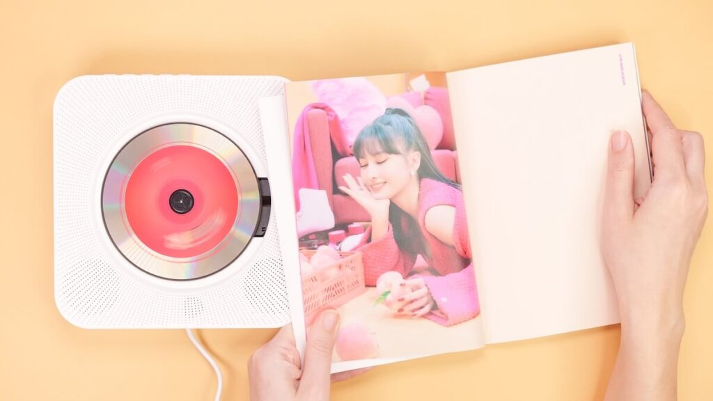 Hands holding Twice Between 1 and 2 mini Album photobook