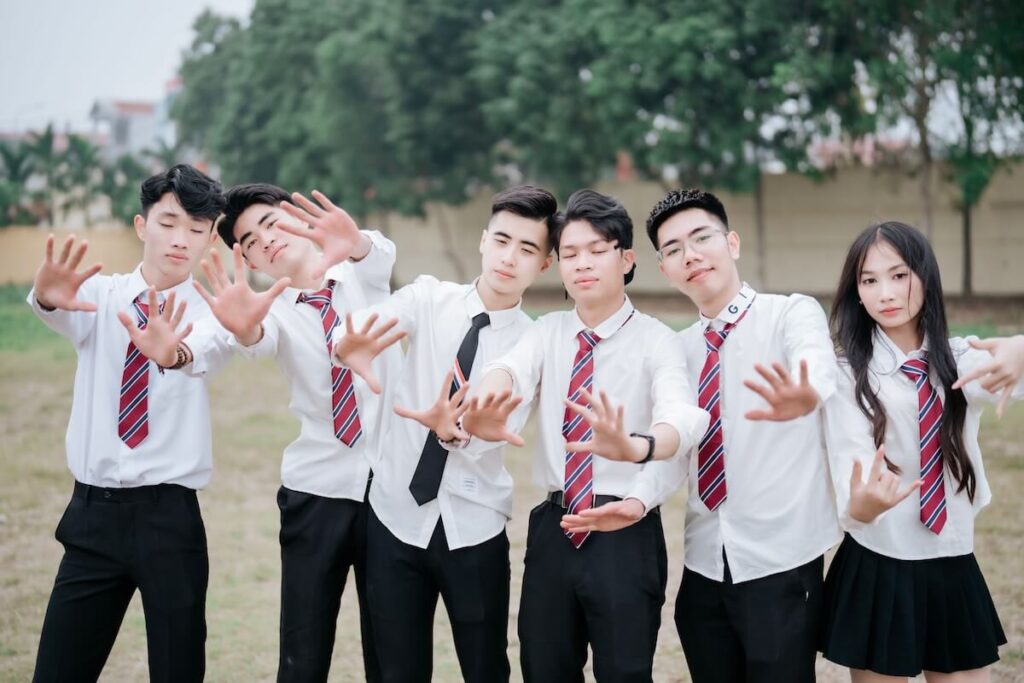 teenagers in school uniforms