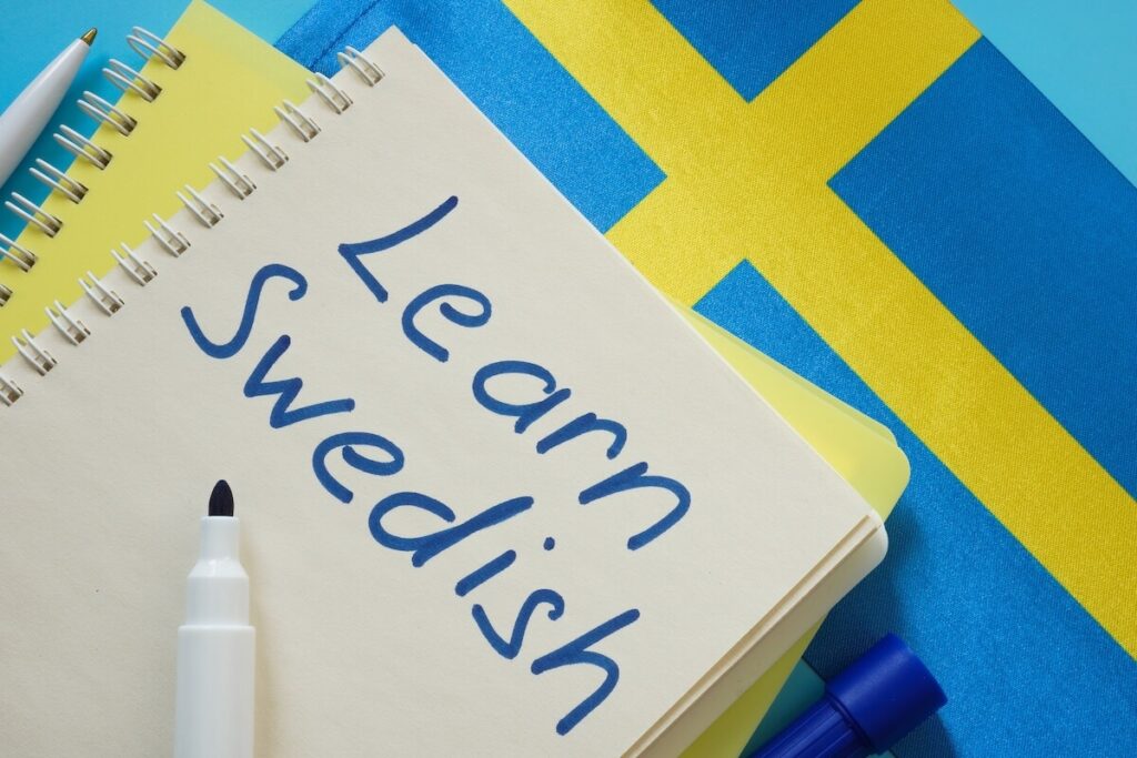 "learn swedish" written on notebook